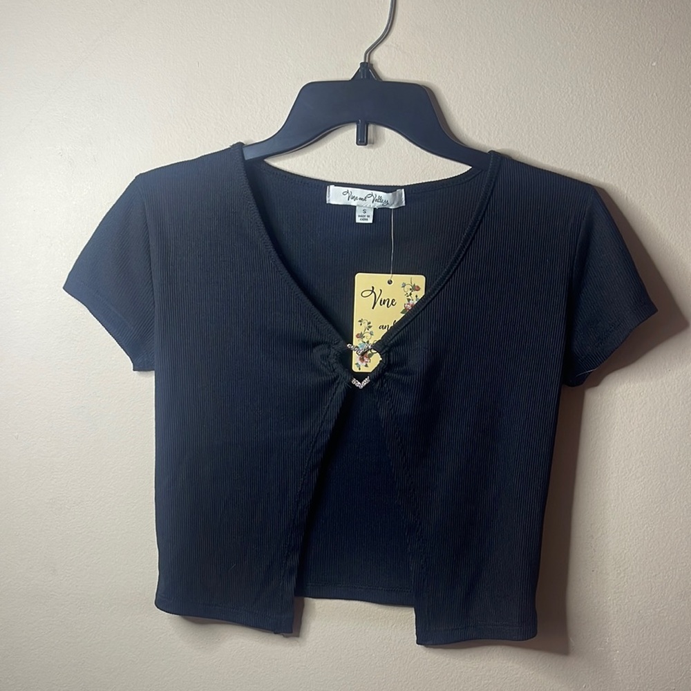 Black small crop top. Brand is Vine and Valley.